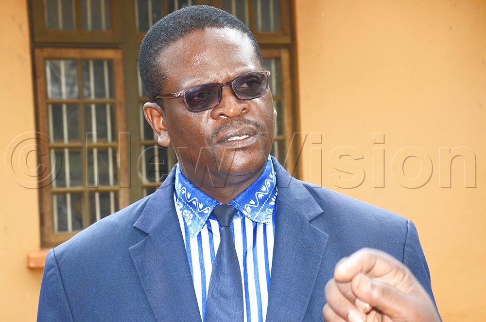 The PFF deputy president in charge of Buganda and the Buikwe South Member of Parliament, Micheal Bayigga Lulume, addressing a press conference at the PFF office in Nakasero, Kampala, on Monday. (Photo by Isaac Nuwagaba)