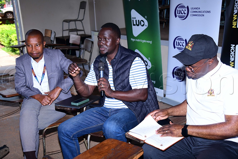 Max Adii, the project lead addressing the students as sponsors Eng George Kyalikunda left and Robert Owagonza right look on. (Photo by Godfrey Ojore)