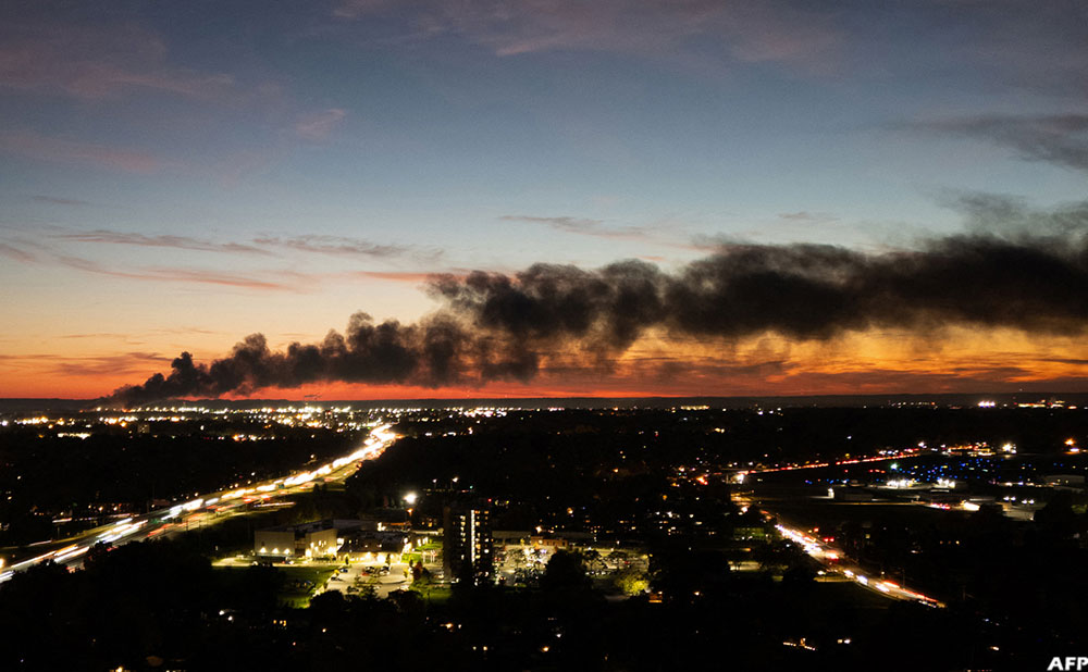 Smoke rises from the site of a UPS cargo plane crash near the UPS Worldport at Louisville Muhammad Ali International Airport in Louisville, Kentucky, on November 4, 2025. (AFP)