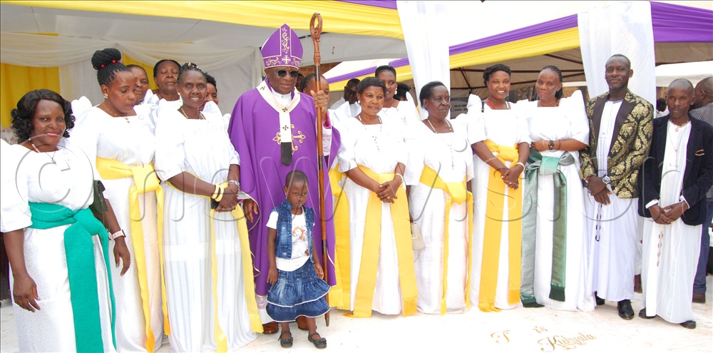 Archbishop Paul Ssemogerere (wearing a mitre) shares a  photo-moment with some of the Catholic married men and women who graced the celebration of the 147th anniversary of Catholic-Muslim Cooperation at Mapeera Memorial sub-parish church Kitebi, in Rubaga Division on February 22, 2026. 