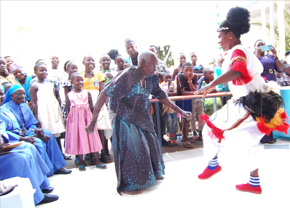 An elderly Christian woman takes on a professional cultural dancer.