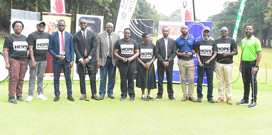 Pastors pose for a family photo with some of the sponsors