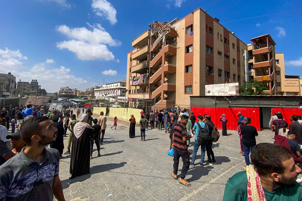 Palestinians gather outside Nasser hospital in Khan Yunis in the southern Gaza Strip on August 25, 2025, following Israeli strikes. Gaza's civil defence agency said Israeli strikes on the hospital killed at least 15 people on August 25, including four journalists and one civil defence member. (Photo by AFP)