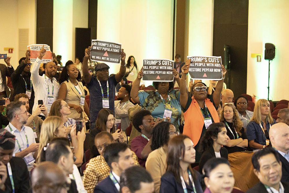 The announcement of the new funding model was overshadowed by protests from HIV activists, who briefly interrupted Graham's presentation during a U.S. government session.