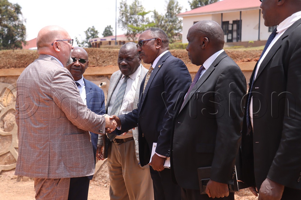 U.S. Acting Ambassador to Uganda, Mikael (Mika) Cleverley, being welcomed at Kabale University. (Photo by Nelson Ahimbisibwe)