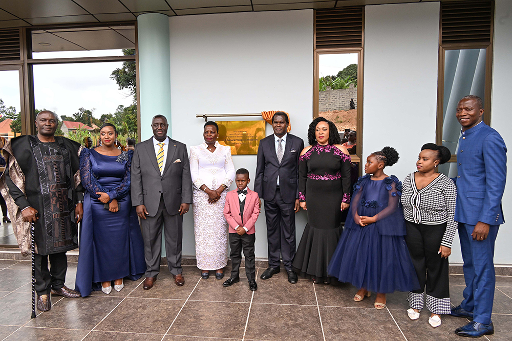 Hon. Beatrice Akello (C), State Minister for Economic Monitoring pose for a photo with Pastor Kenneth Kato (3rd left) and his wife Oliver (2nd left) and Pastor Robert Kayanja (5th right) and his wife (4th right) after commissioning Life Restoration Ministries. (PPU)