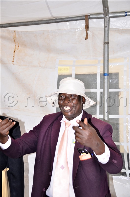 An aspiring presidential candidate and retired teacher from Tororo, Muton Robert  celebrate after picked the  nomination forms during pick of forms for presidential candidates at Electoral Commission offices in Kampala on 11 Aug 2025. 