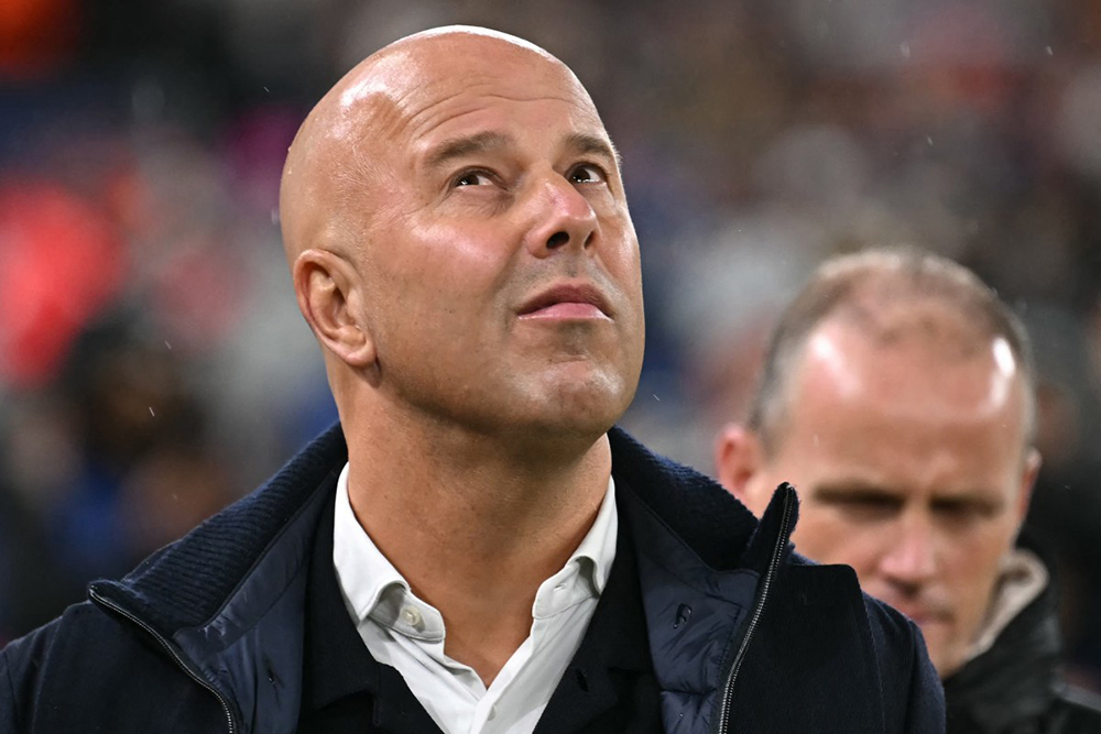 Liverpool's Dutch manager Arne Slot arrives ahead of kick-off in the UEFA Champions League, league phase football match between Liverpool and Real Madrid at Anfield in Liverpool, north west England on November 4, 2025. 