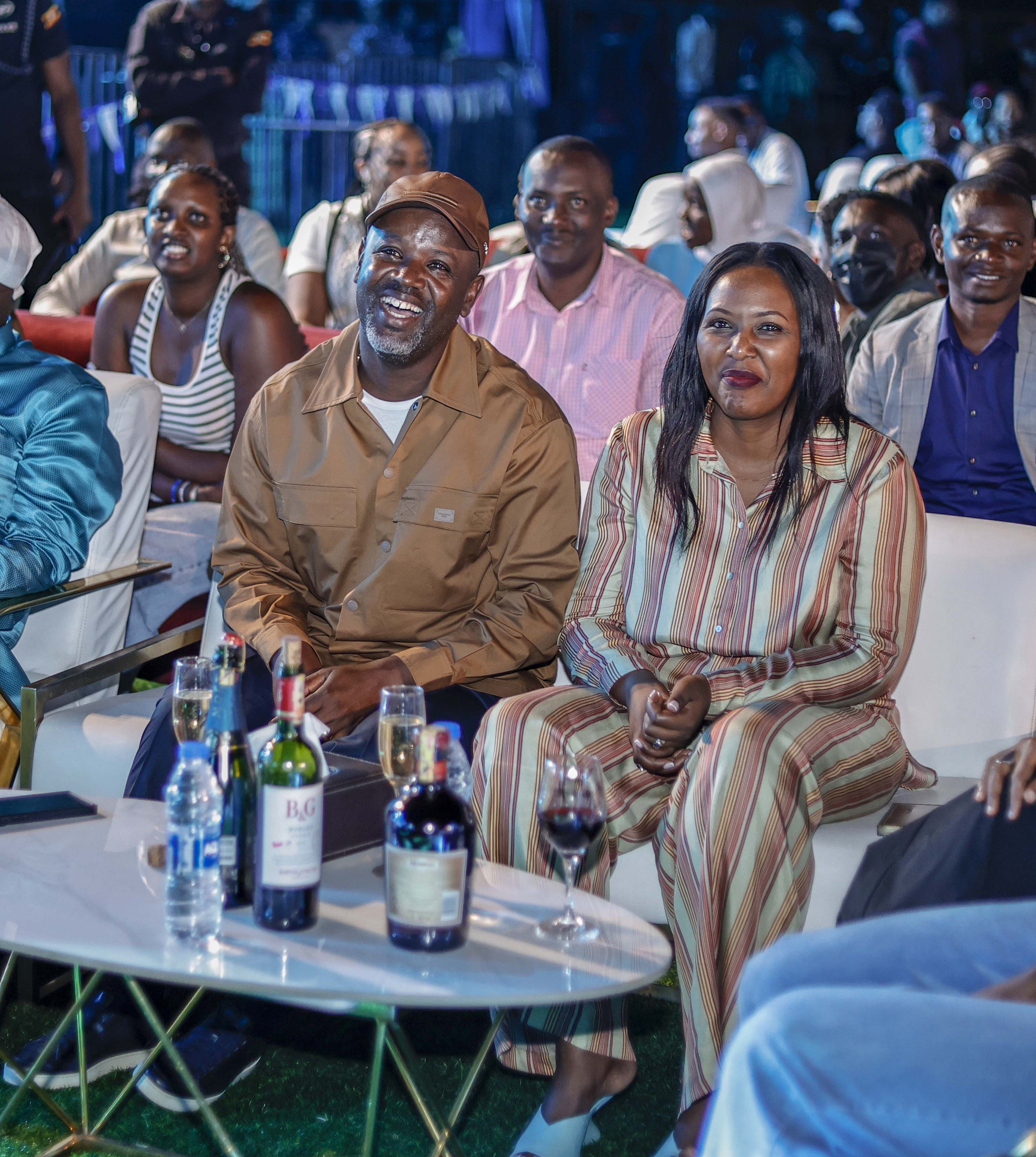 Deputy Speaker Thomas Tayebwa And His Wife Enjoying Maulana And Reign's Comedy During Comedy Store Ug Retro Tour At Lugogo Cricket Oval. Photo By Ignatius Kamya