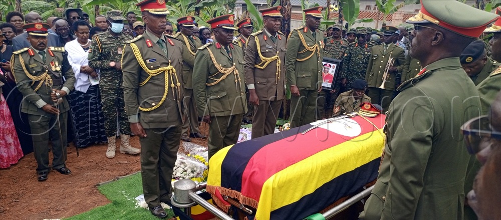 The body of late Maj Gen Francis Takirwa being lowered into the grave. He was buried on Thursday in Bugarama Sayuni village in Bwizibwera-Rutoma town council-Kashari South-in Mbarara district.