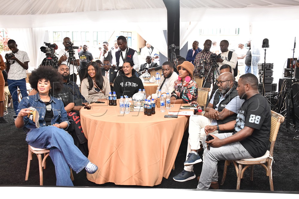 Vision Group CEO Don Wanyama at the table with Makoma.