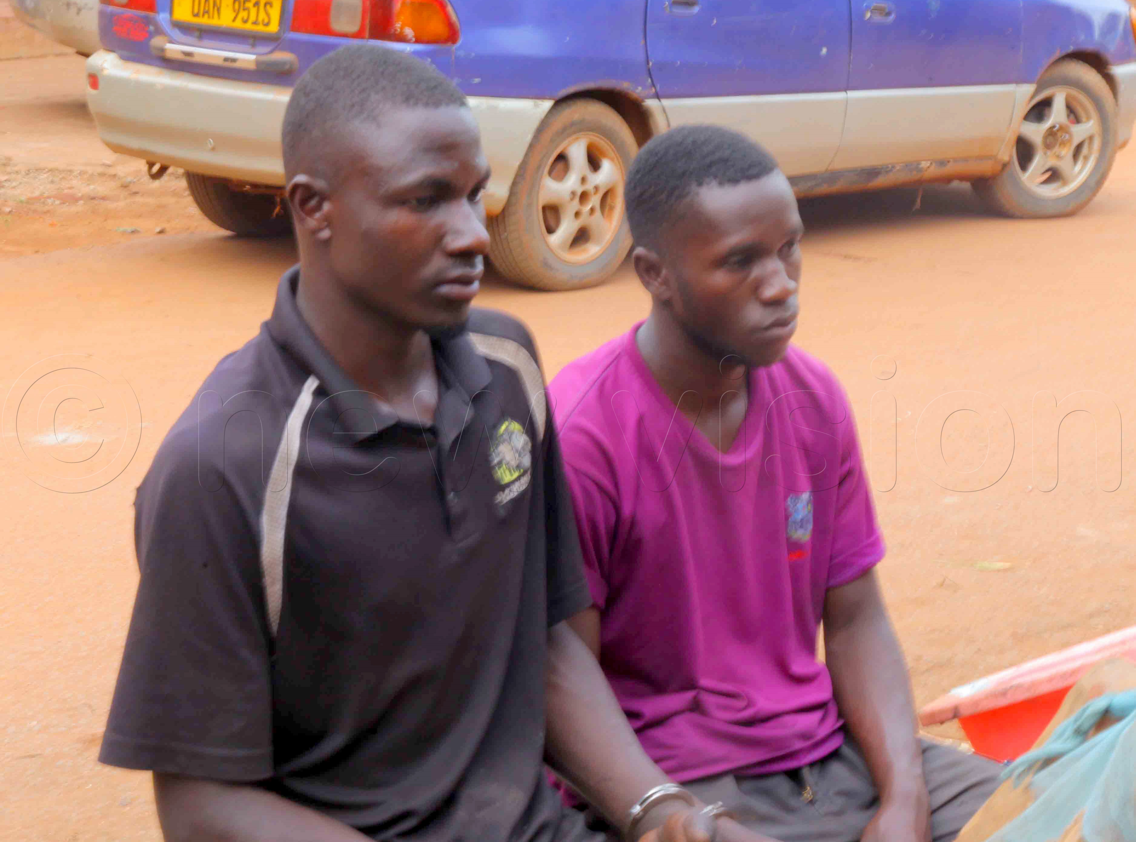 Two of the nine suspects arrested in connection with motorcycle robberies that have been escalating in different areas of Wakiso and neighbouring districts. (Photo by Peter Ssaava)