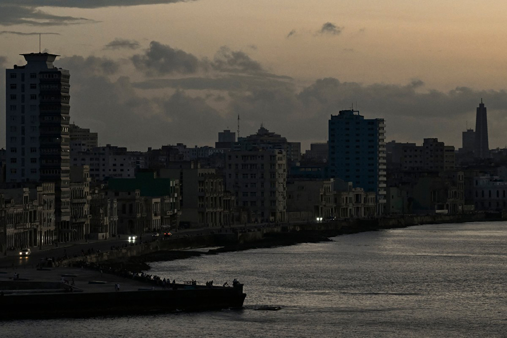 This view shows buildings at sunset during a blackout in Havana on March 16, 2026. (AFP)