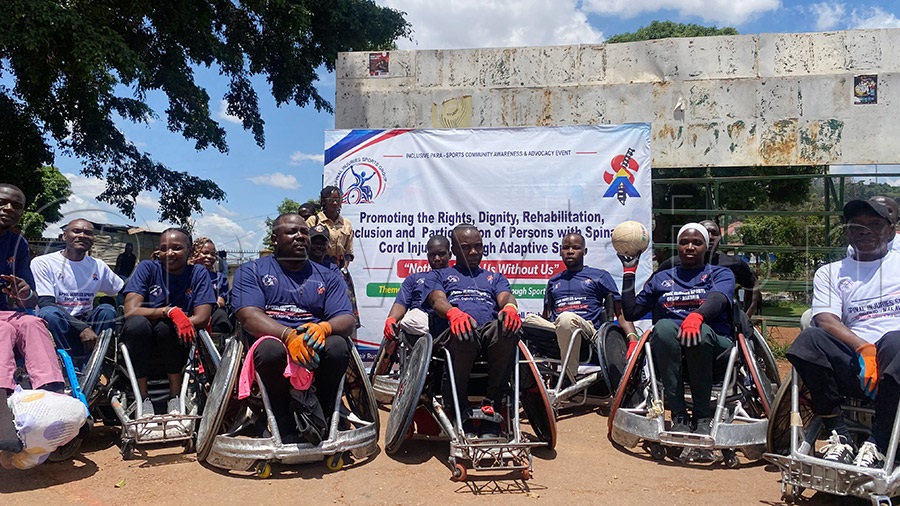 Members of the spinal cord injury team pose with their trophy 