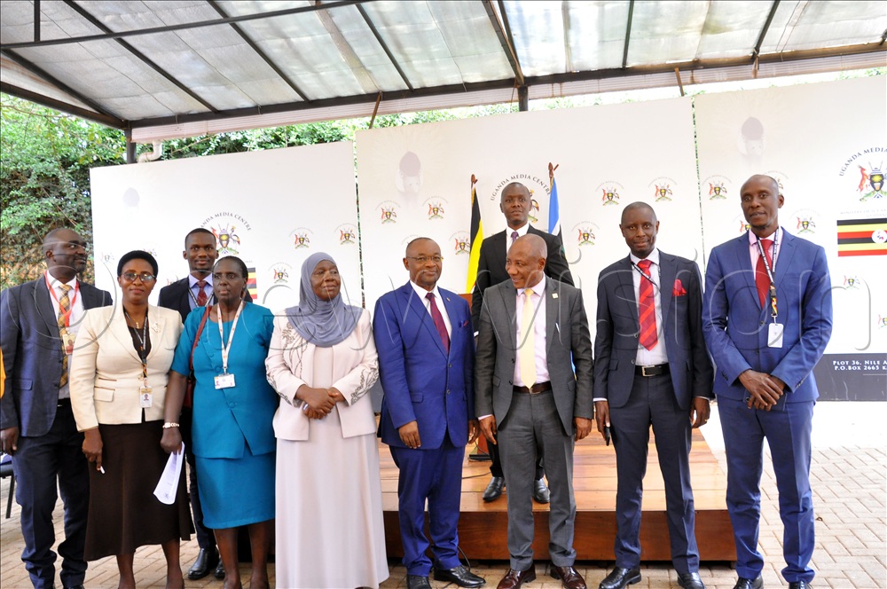(R-L) Benon Yiga Kira Town Clerk, Charles Magumba Commissioner Urban Administration Ministry of Local Government, Godfrey Kabbyanga State Minister of ICT, Raphael Magyezi Minister of local government, Minsa Kabanda Minister for Kampala, Winnie Twine Presidential advisor on markets, Daniel Nuwabiine Spokesperson KCCA and other officials pose for a group Photo. This was during a press conference at the Uganda Media Centre on April 28, 2026. 