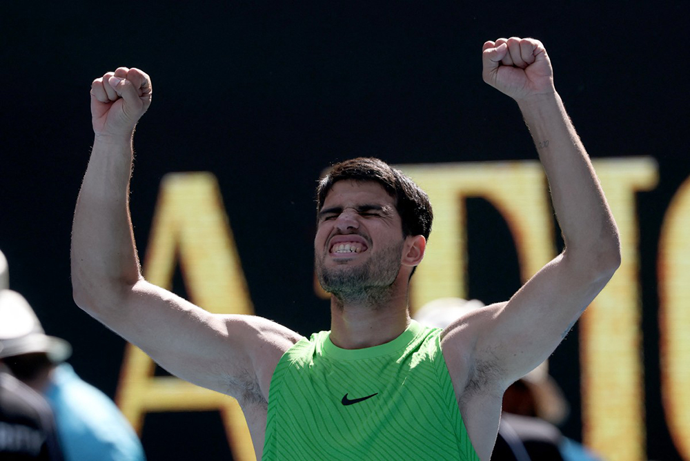 Spain's Carlos Alcaraz celebrates victory over USA's Tommy Paul after their men's singles match on day eight of the Australian Open tennis tournament in Melbourne on January 25, 2026. 
