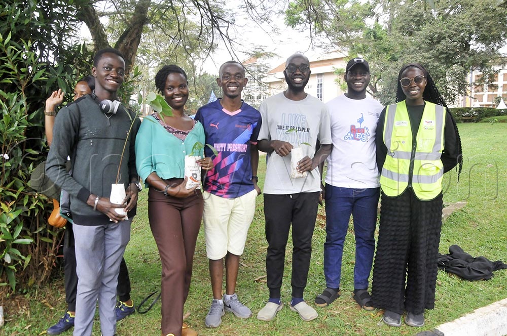 Members of the Rotaract club of Kampala Central, before planting trees at Makerere University, aimed at conserving the environment. (Credit: Wilfred Sanya)