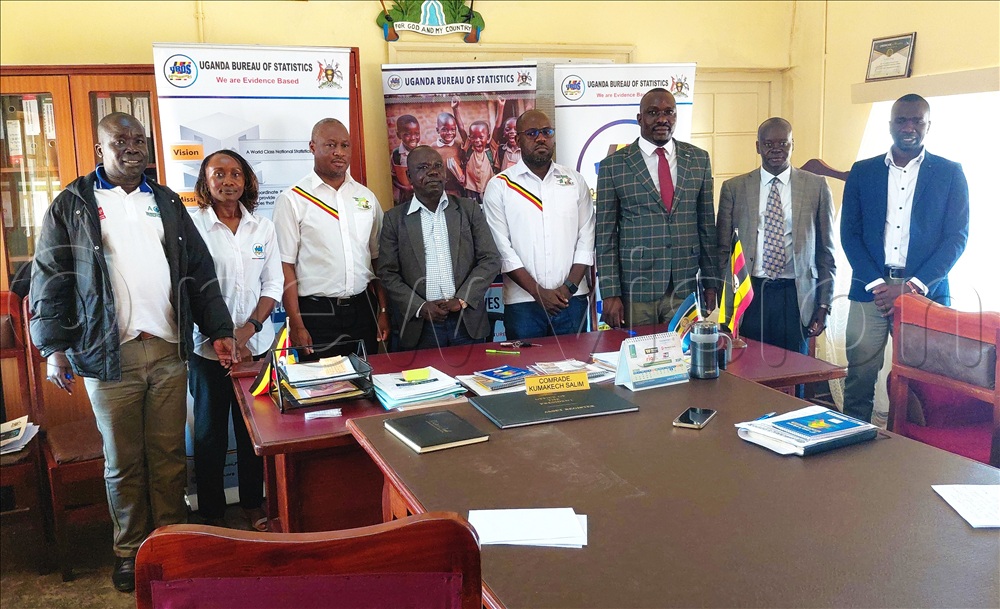 The UBOS and Aarua City officials pose for agroup photo after the press briefing in RCCs office in Arua City.