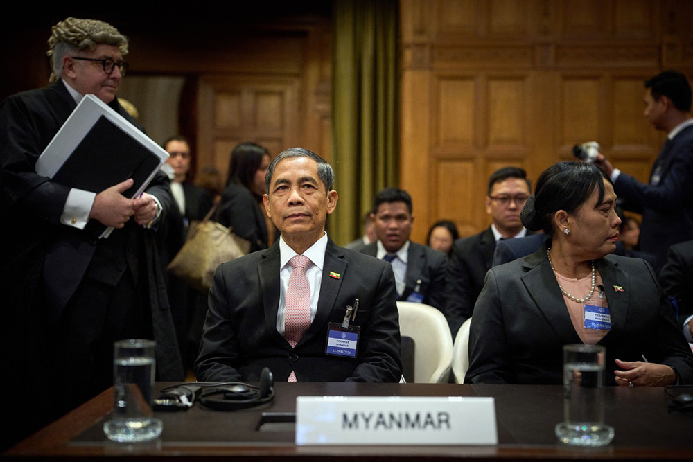 Myanmar's Minister of International Cooperation Ko Ko Hlaing waits for the start of the first hearing at the International Court of Justice in which Myanmar is accused of committing genocide against the country's Muslim minority, the Rohingya, in the Hague on January 12, 2026. (Photo by Phil Nijhuis / ANP / AFP)