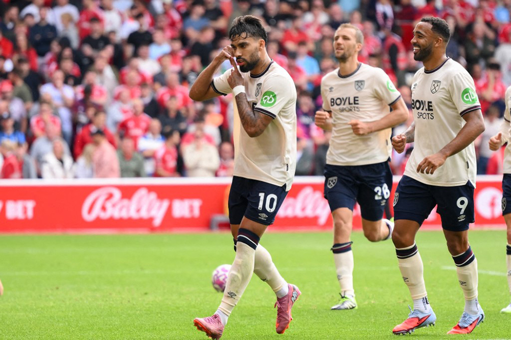 Lucas Paqueta of West Ham United celebrates after scoring a goal to make it 0-2 during the Premier League match between Nottingham Forest and West Ham United at the City Ground in Nottingham, on August 31, 2025.