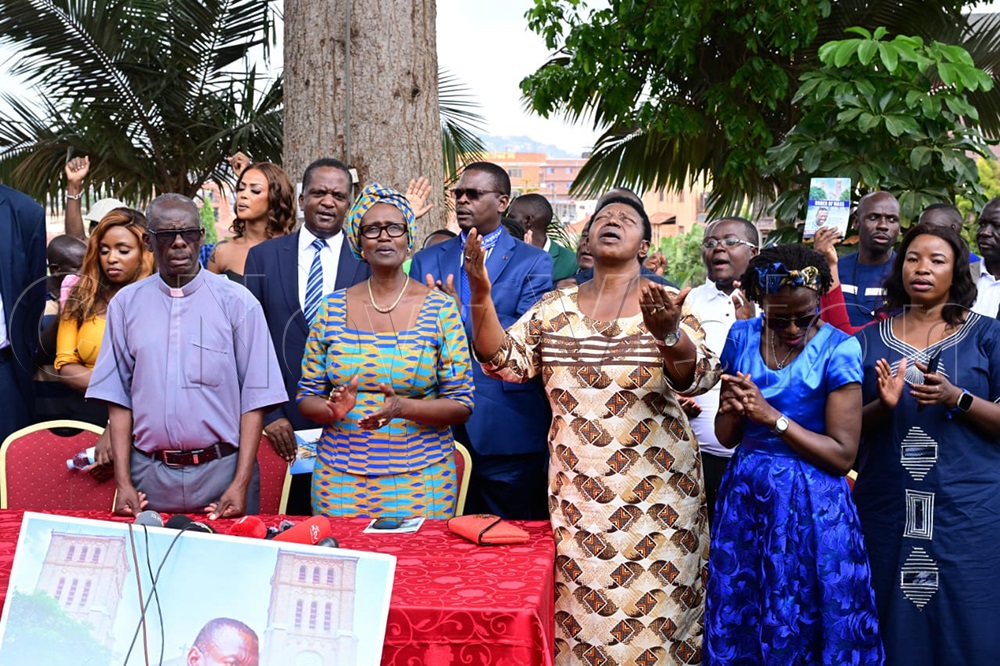 Winnie Byanyima and Maria Matembe alongside her at Rubaga. (Credit: Eddie Ssejjoba)