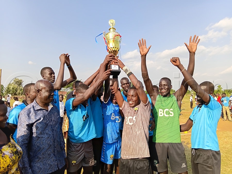 Bukedea Comprehensive School (Bukedea District) displaying the trophies they won in boys' and girls' volleyball during the Teso Zone Ball Games II and Athletics qualifiers