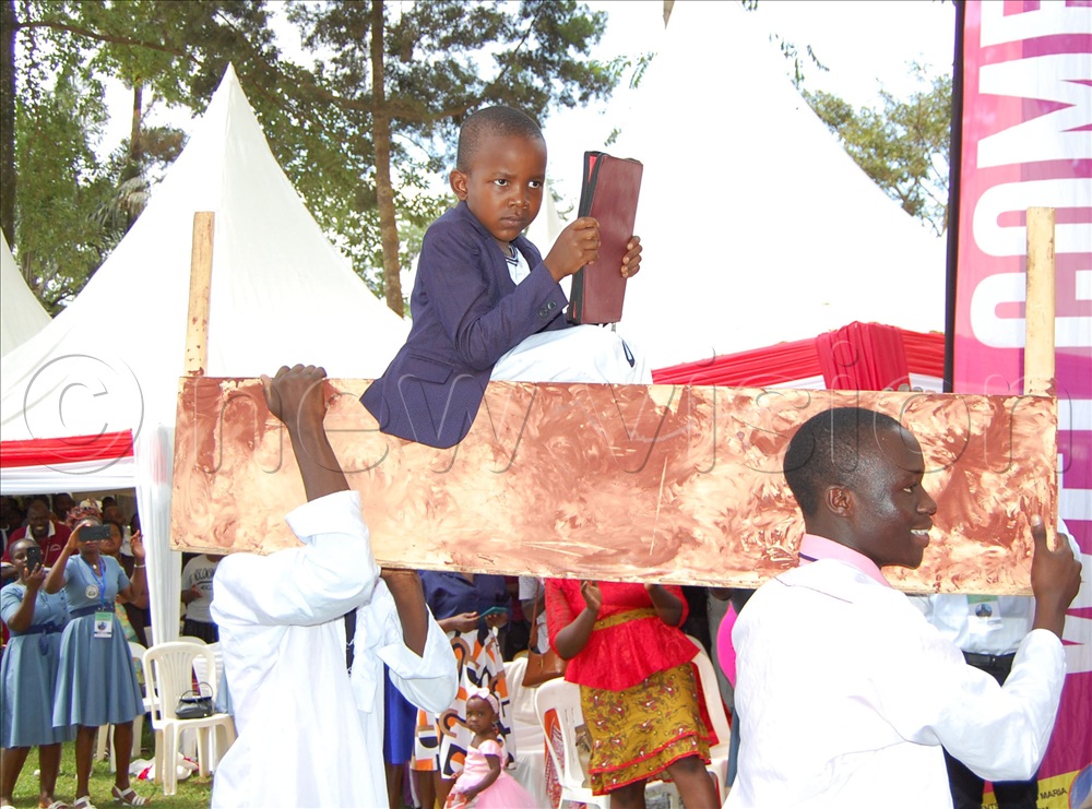 A spectacle of the dramatised procession of the Holy Book during mass.