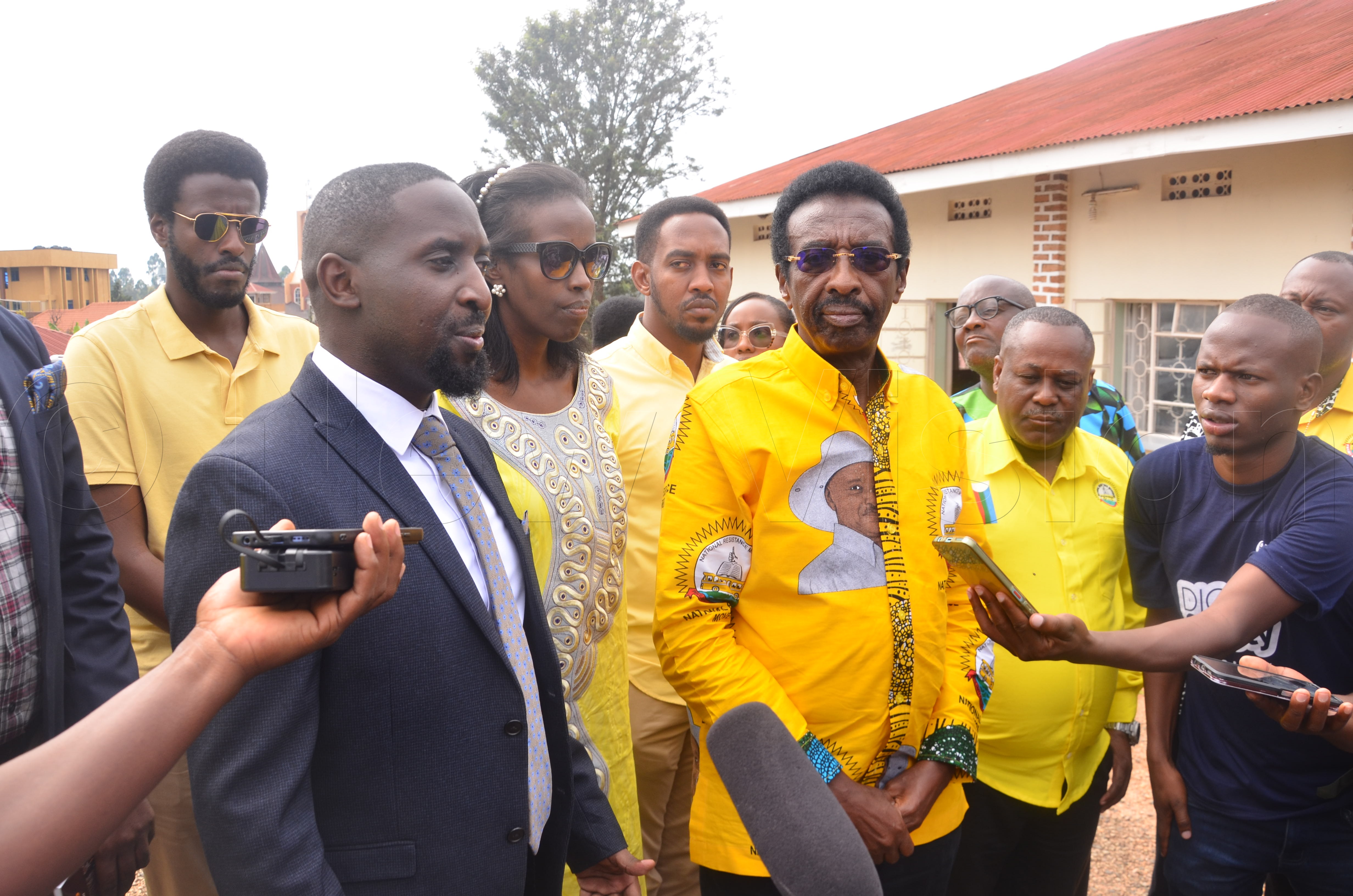Security minister and incumbent Member of Parliament for Rujumbura, Jim Muhwezi (Centre) during his nomination. (Photo by Caleb Bahikaho)