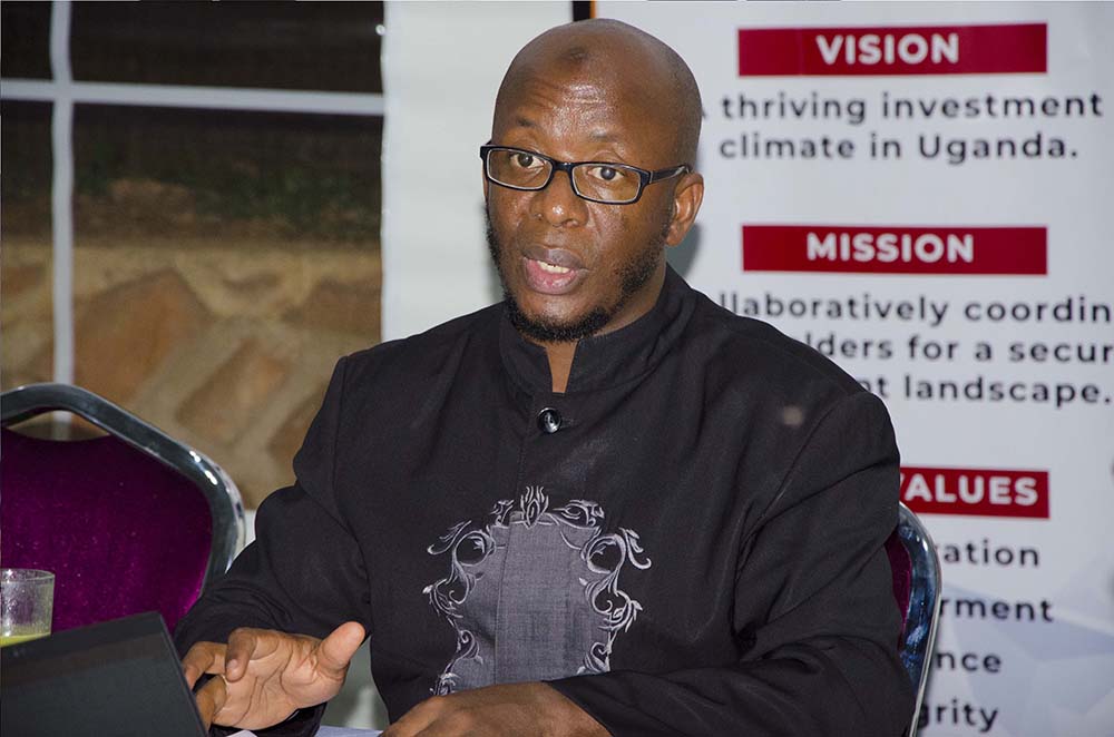 Dr. Barirega Akankwasah, PhD, Executive Director National Environment Management Authority (NEMA) who chaired the meeting making his remarks. (Credit: PPU)