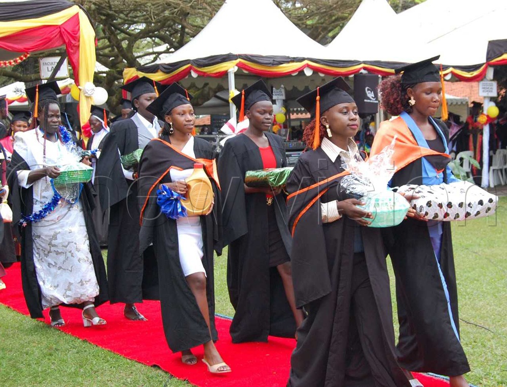 Graduands carrying offertory during mass.