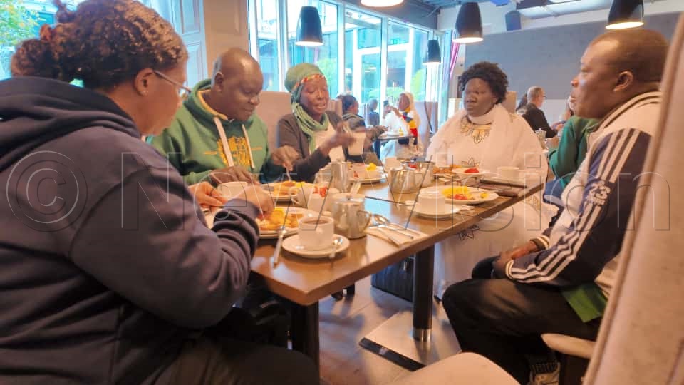 Teachers having a meal. (Credit: Roggers A)