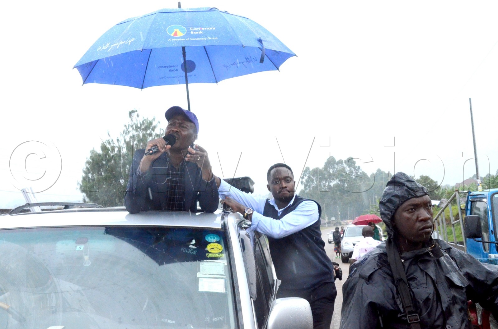 Muntu addressing supporters even when the rain started to fall.