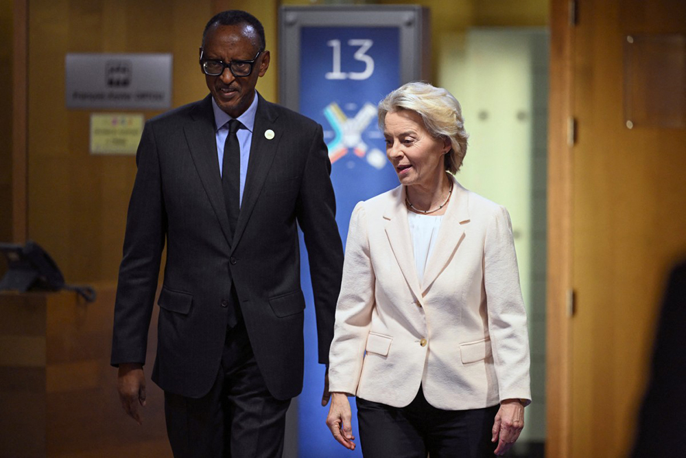 European Commission President Ursula Von der Leyen (R) and Rwanda's President Paul Kagame arrive for a meeting, as part of the Global Gateway forum at the EU headquarters in Brussels on October 9, 2025.