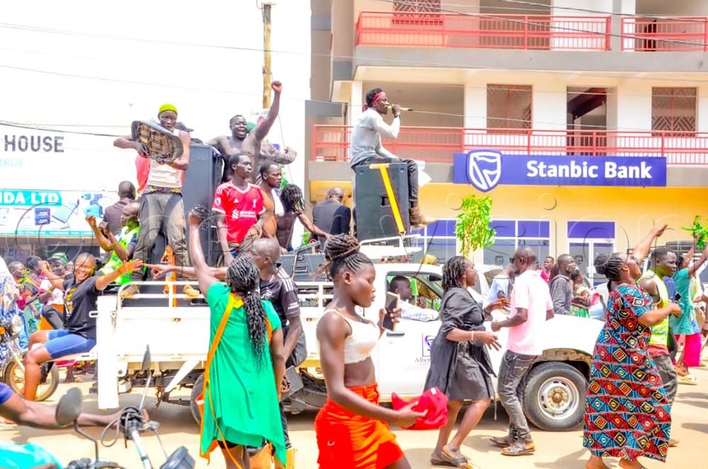 Lawrence Alionzi Dangote supporters jubilating after the latter's announcement. (Credit: John Paul Opio)    