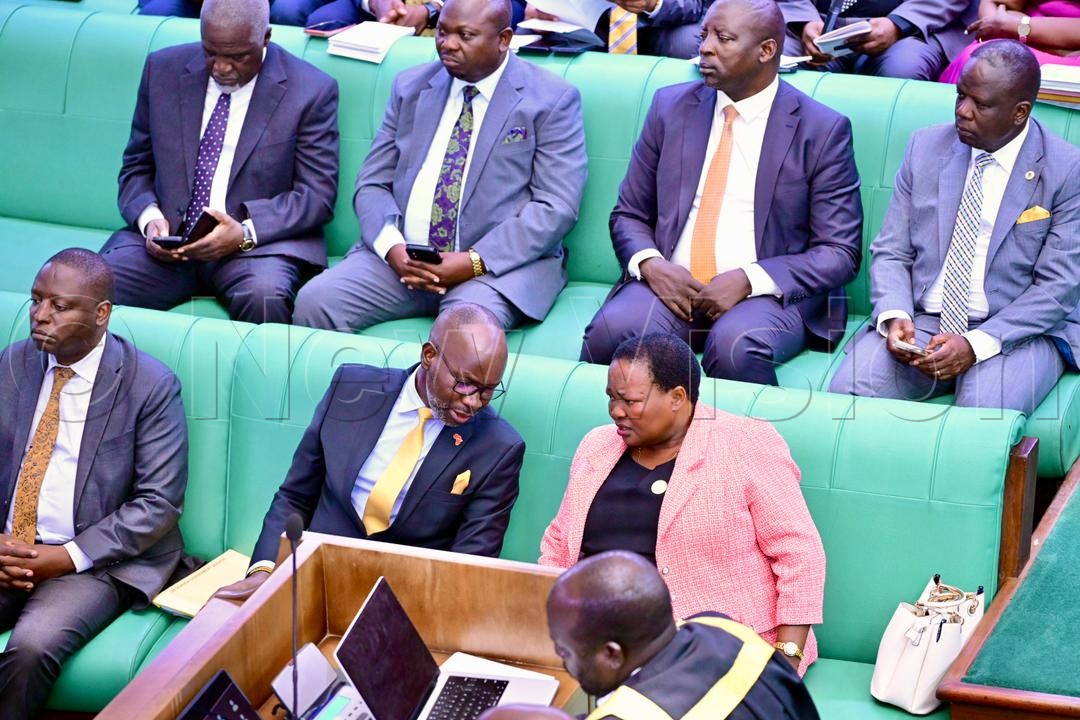 PM Nabbanja interacting with Denis Hamson Obua. (Credit: Miriam Namutebi)