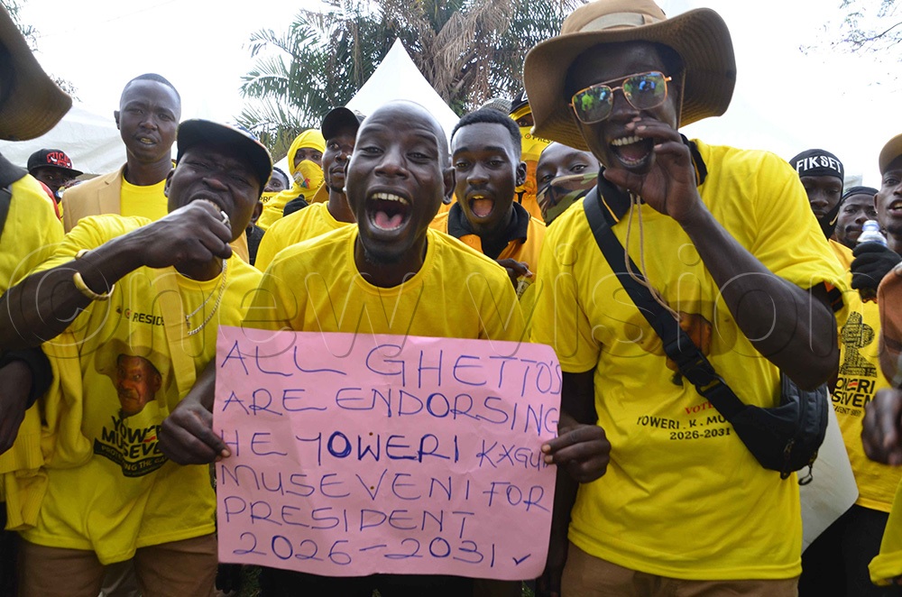 Ghetto youths cheering NRM slogans during the Dipo Ku Dipo Ghetto task force launch on December 23, 2025 in Makindye (Photo by Stuart Yiga)