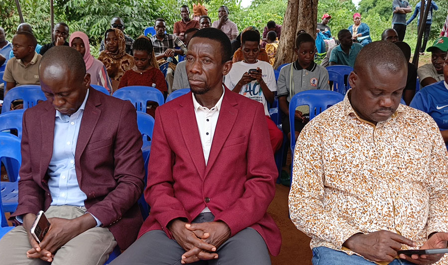 Club Patron and football promoter Frank Mutalaga (centre) at the late Lydia Nakijoba's funeral in Ntawululwa &ndash; Bamunaanika