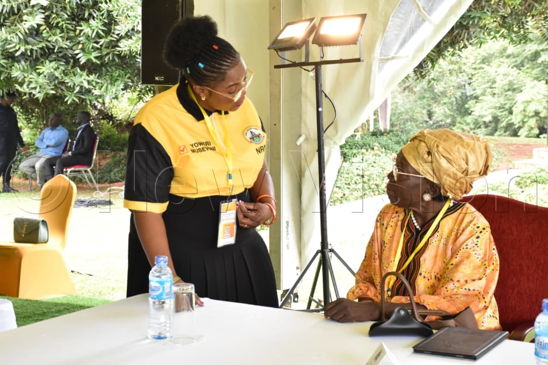 Namuganza and Kadaga interacting at the delegates conference.