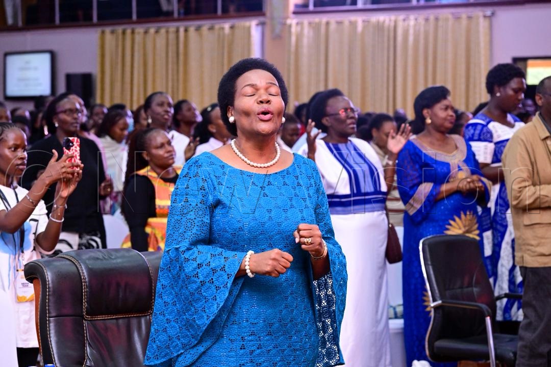 Ms Irene Kauma in a moment of worship.