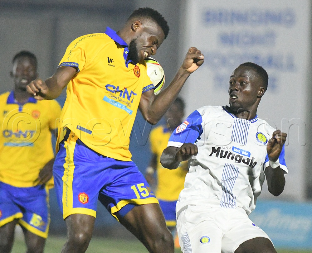 KCCA FC's Enock Walusimbi (L) contests the ball with URA FC's Joseph Ssemujju during a Uganda Premier League match at the Phillip Omondi Stadium, November 21, 2025. KCCA won 2-1. (Credit: Michael Nsubuga)