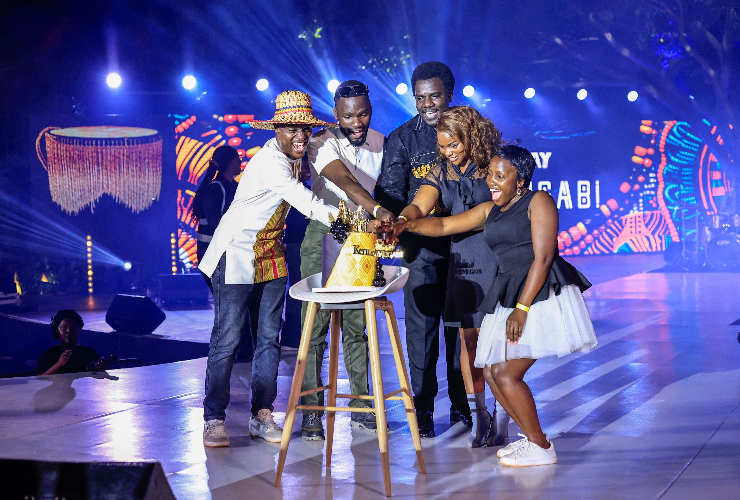Fans Joined Kenneth Mugabi On Stage For Cake Cutting To Celebrate His Birthday. Photo By Ignatius Kamya