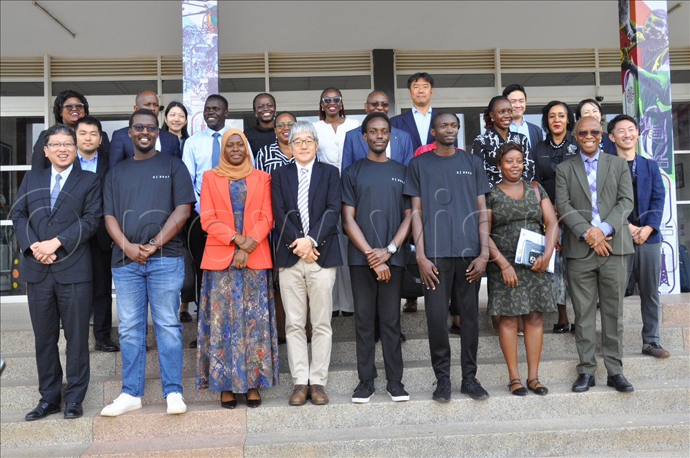 (centre) Aminah Zawedde the Permanent Secretary Ministry of ICT, Osaki Mitsuhiro Chief Representative JICA Uganda and other officials pose for a group photo after a meeting on Uganda ICT Industry promotion project at National ICT innovation hub Nakawa on August 25, 2026.