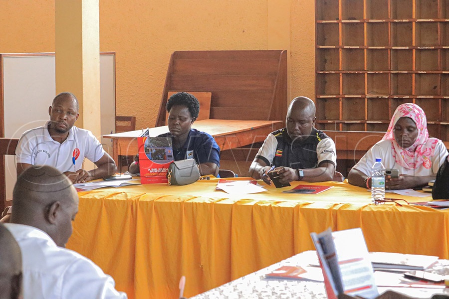 Ministry of Education and Sports and USSSA officials inspect facilities at a bidding school