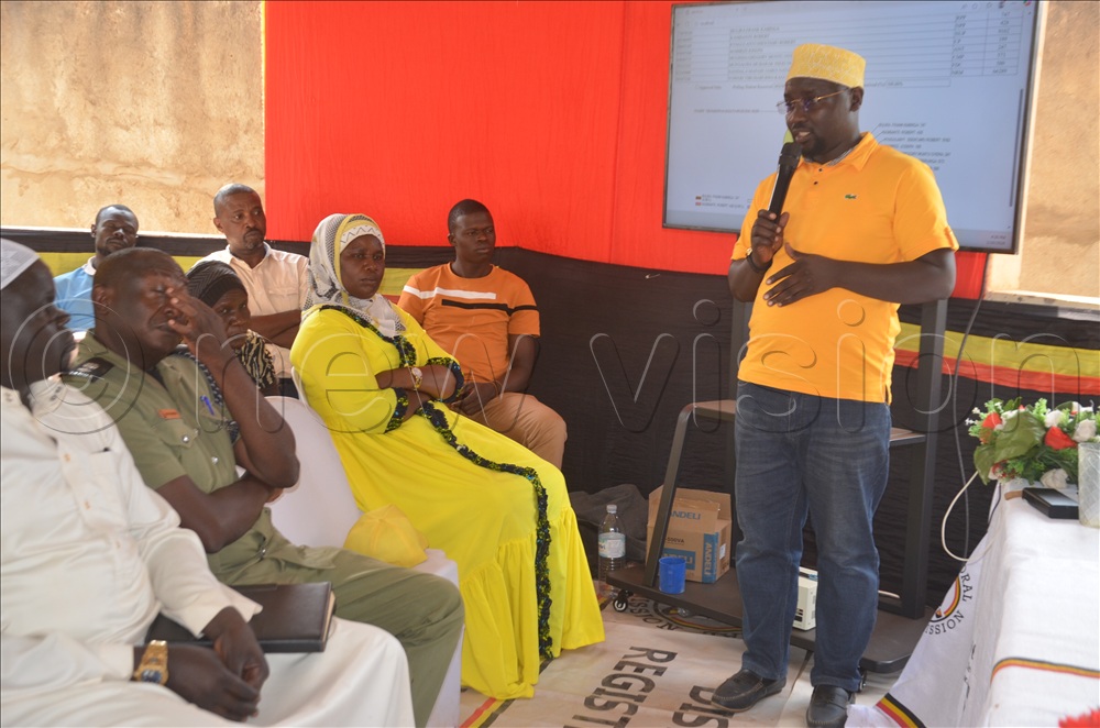 Hajji Sulaiman Lubwama Bukya, RDC Yumbe addressing candidates and agents during the ceremony to declare results on Friday evening at Yumbe EC office.