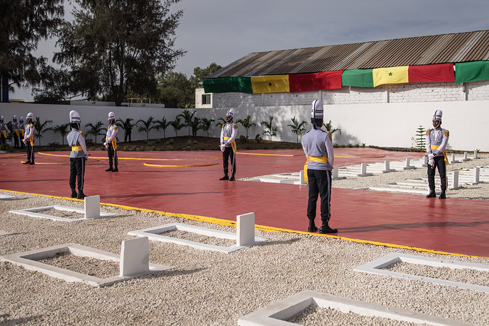 Members of the Senegalese Armed Forces stand guard at the Thiaroye Military Cemetery on December 1, 2024 after a ceremony marking the 80th anniversary of the Thiaroye Massacre. (AFP)