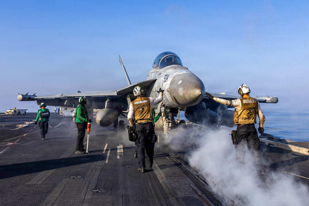 This US Navy handout photo released by US Central Command public affairs shows an EA-18G Growler, attached to Electronic Attack Squadron (VAQ) 133, preparing to launch from the flight deck of Nimitz-class aircraft carrier USS Abraham Lincoln (CVN 72) in support of Operation Epic Fury on March 2, 2026. (AFP)