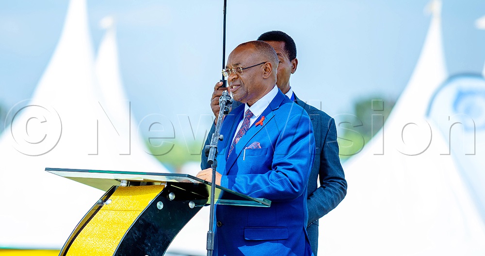 The Minister of Local Government Raphael Magyezi, addressing guests during the World AIDS Day commemorations in Kizinda Town Council in Bushenyi on Monday. (Credit: Agnes Kyotalengerire)