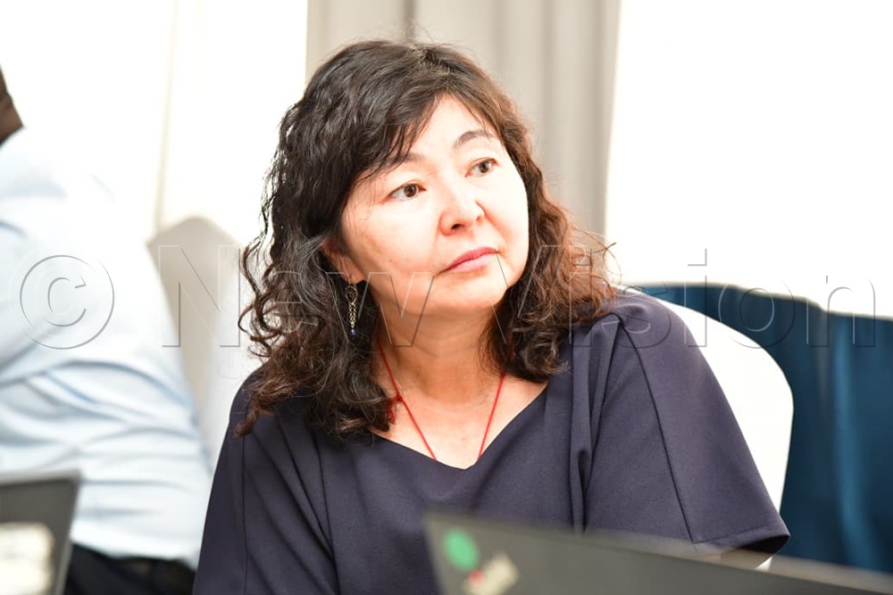 Kunduz Masylkanova, Senior Agriculture Economist at the World Bank Group, follows proceedings during the Agri-Connect stakeholders’ consultation in Kampala. (Photo by Mpalanyi Ssentongo)