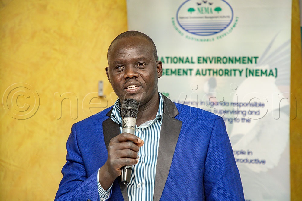 The Chemical Safety, Radiation, and Pollution Prevention Manager, NEMA Uganda Dr. Innocent Achaye addressing participants during the conference. (Photo by Agnes Kyotalengerire)