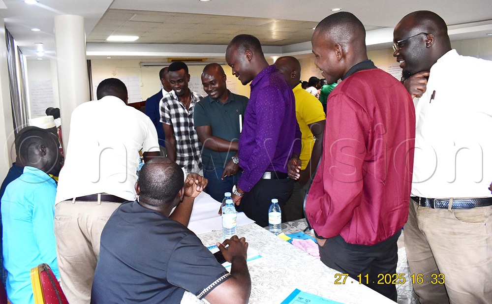 Male participants attending a group discussion as part of the training. (Photo by Violet Nabatanzi)